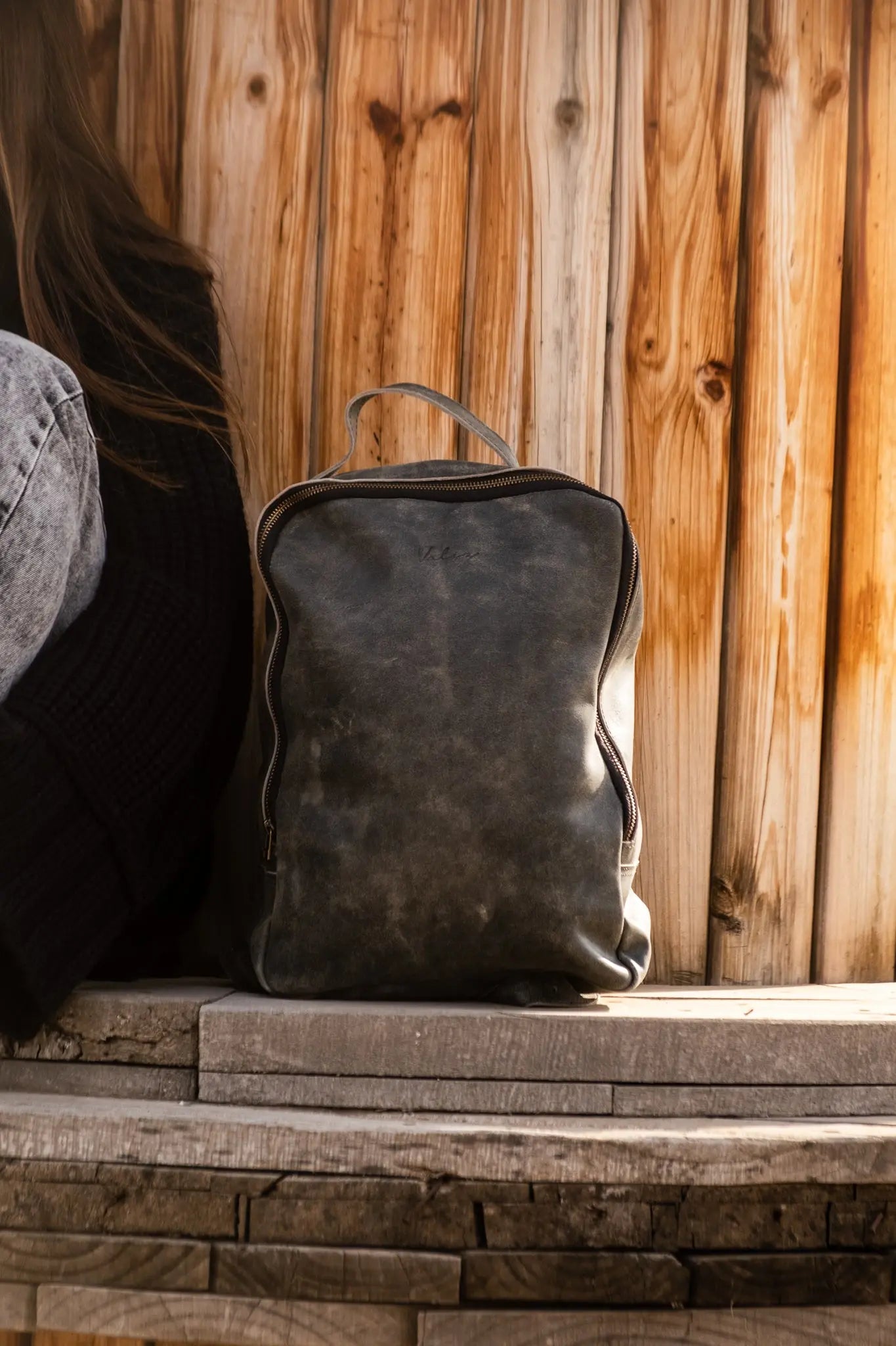 <transcy>Large Backpack Black Worn</transcy>
